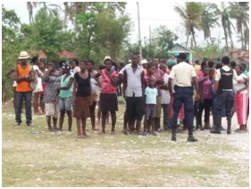 Some of the Les Cayes residents who gathered for the distribution of family packages by the CARICOM contingent.