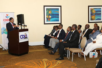 The Hon. Peter Turnquest, Deputy Prime Minister and Minister of Finance, Government of The Bahamas delivering key note address at the launch of CDM10
